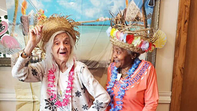 Happy hula dancing residents