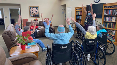 Group of elderly residents enjoying excercise