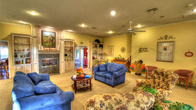Beautifully furnished memory care resident family room