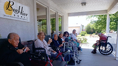 Friends enjoy ice cream on the porch