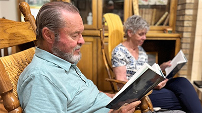 Elderly couple reading