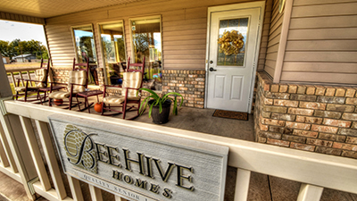 Our welcoming front porch and entrance to the BeeHive Home