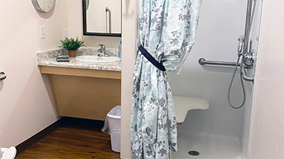 ADA approved bathrooms and showers for every resident