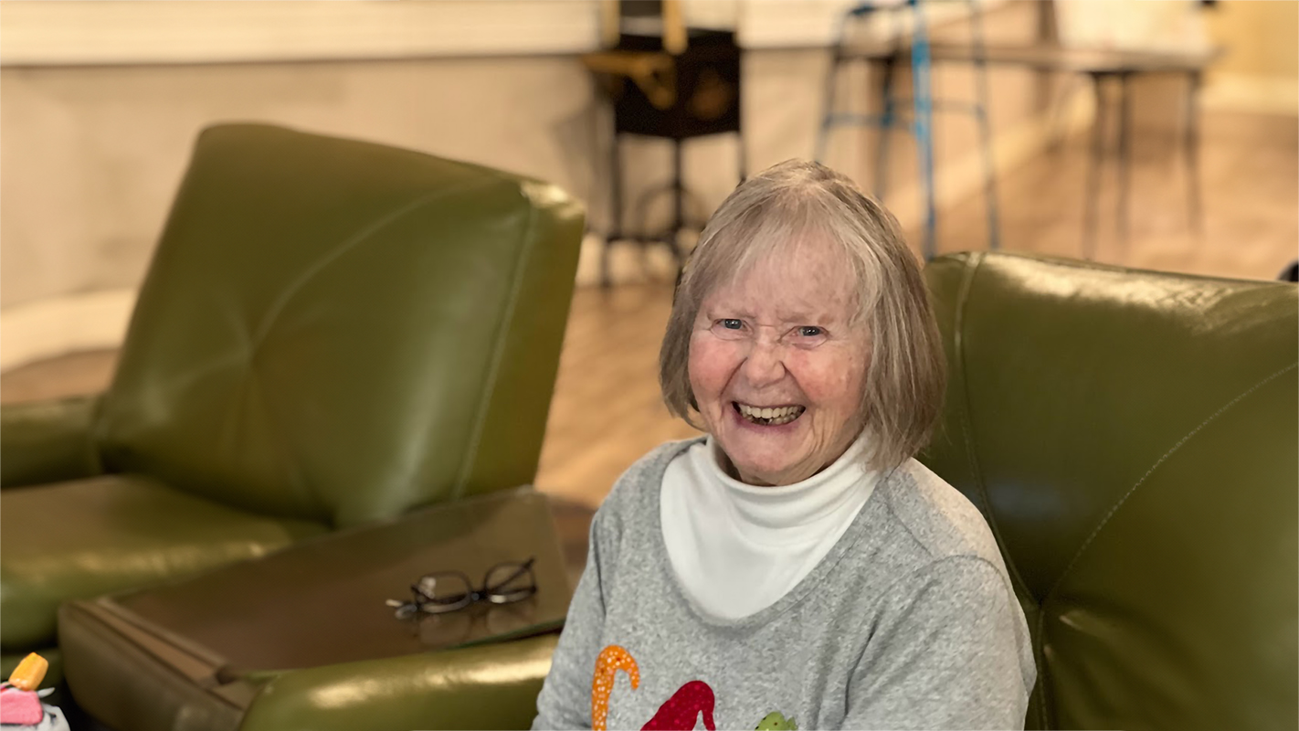 Happy resident in living room