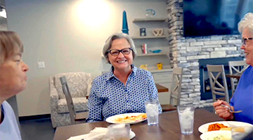 Three smiling senior women