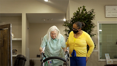 Caregiver and resident converse