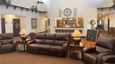 Beautifully furnished living room with leather couches